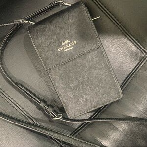 authentic COACH North South Phone Crossbody
